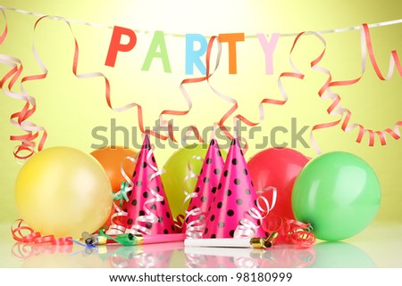 Party items on green background