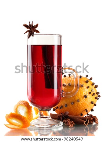 mulled wine in the glass, spice and orange isolated on white