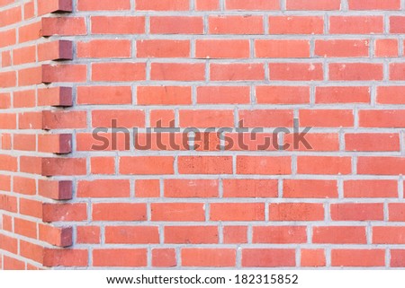 Red brick wall corner background