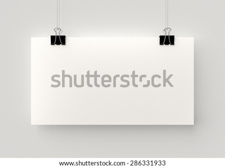 Poster hanging on a thread with two black clips. Blank horizontal sheet of paper against a concrete wall mock up. Urban minimalistic style portfolio presentation concept.