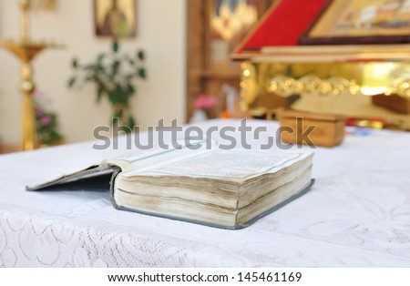The book with the prayers of the church on the table.