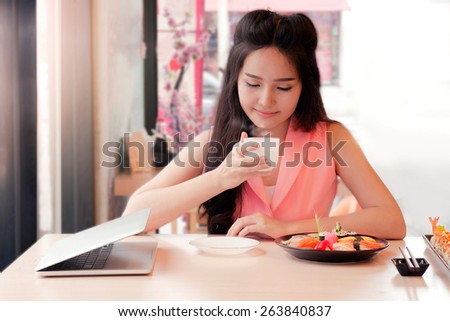 girl with coffee in thai japan restaurant