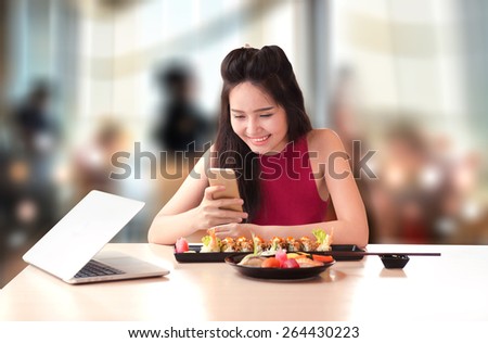 smile girl with social media in japan restaurant