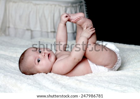 Baby play with feet