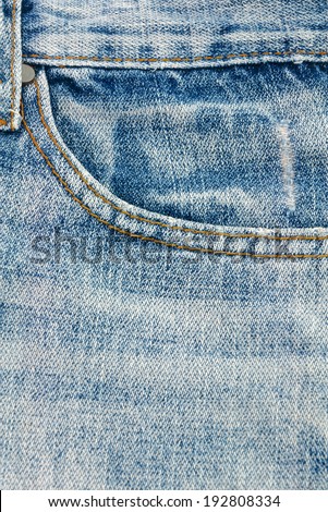 Blue jeans pocket for storing small items.