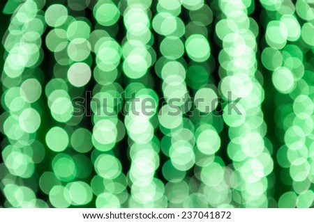 Circle or bokeh caused by many green lights.