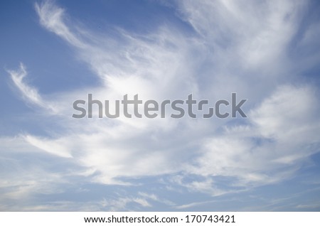 Cumulus clouds and veils
