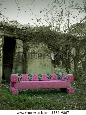 New Sofa against abandoned rural place in black and white vertical