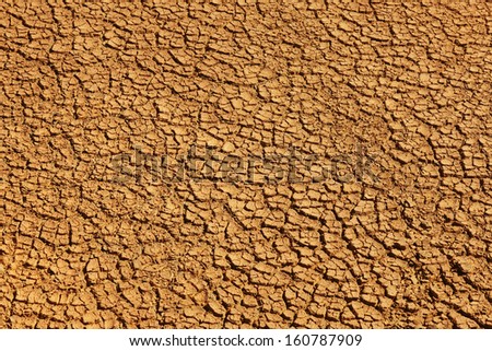 Closeup of a large dry mud field warm tone cracked land in Reykjanes Peninsula Iceland