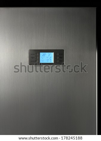 Modern refrigerator display control panel in aluminum surface
