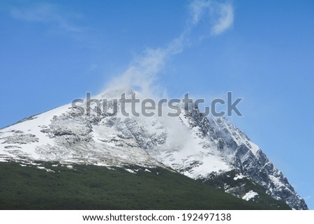 Patagonian landscape with mountain and snow