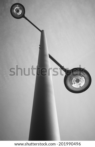 Modern street lamp in black and white. Vertical format