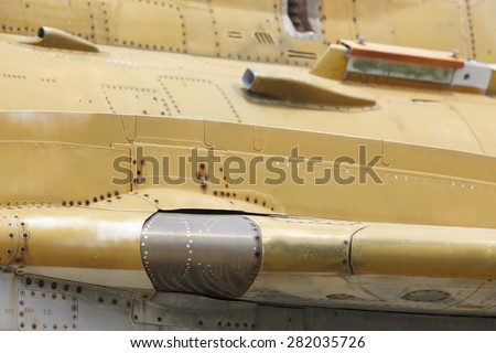 Rusty fighter plane fuselage detail. Horizontal