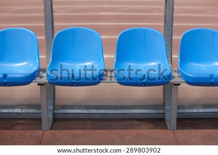 Stadium seats for substitutes and trainer in a football ground