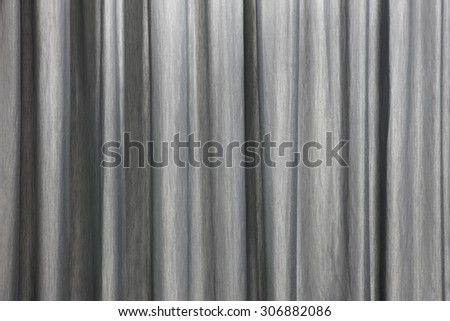Curtain background detail with waves in black and white. Horizontal