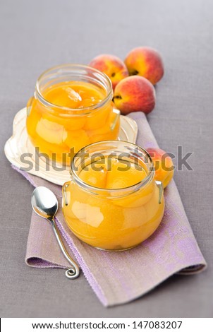 peaches canned in natural banks on a napkin