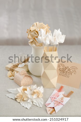 origami flowers vase decor package card table decoration and interior laid out on the table