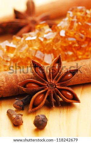 Close up of spices and brown  rock candy sugar for christmas cake