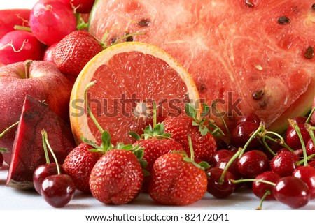 Red and fresh fruits and vegetables, background