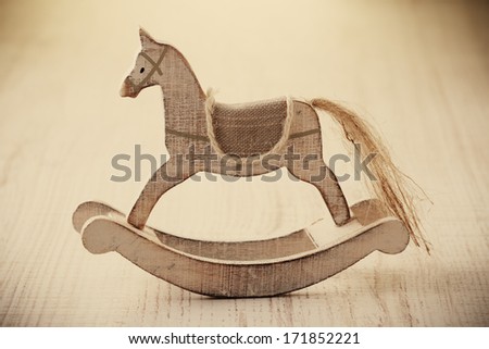 Old Rocking Horse On A Rustic Country Backdrop.