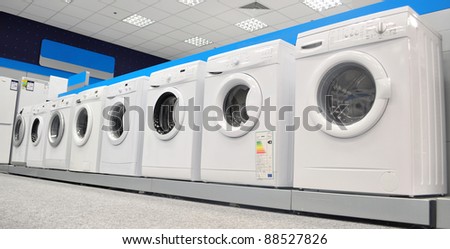 image with a display of washing machines in a market