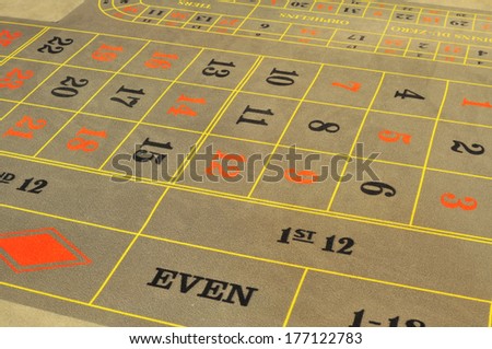 image with a casino roulette grey layout with numbers for bet