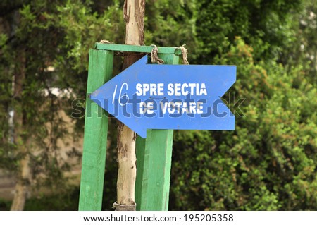 romanian language text vote center arrow sign