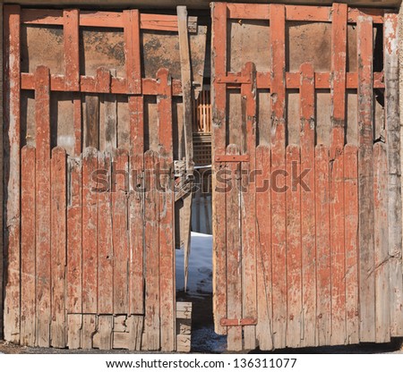 Old wooden backyard door, front view shot composition