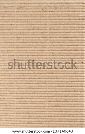 Photo of corrugated brown cardboard as abstract background