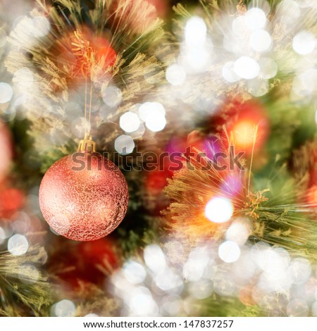 Seasonal Christmas Decoration Background As A Fragment Of A Decorated Christmas Tree Covered With Bokeh Light Effect