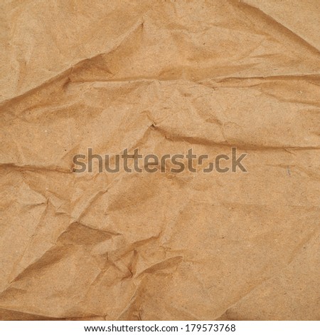 Creased cheap brown packaging paper texture background