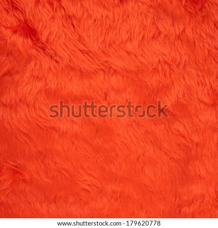 Colored red faux fur texture background fragment