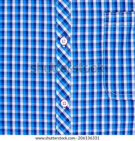 Blue squared shirt with the buttons and pocket fragment as a background composition