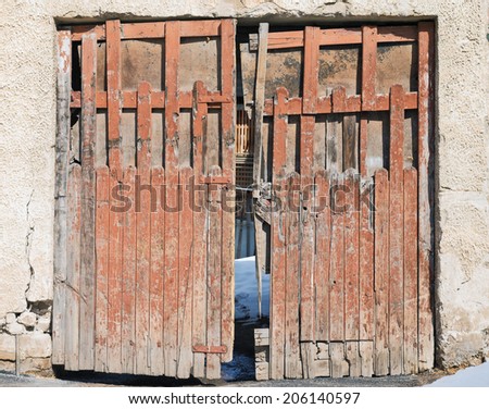 Backyard old wooden door, front view shot composition