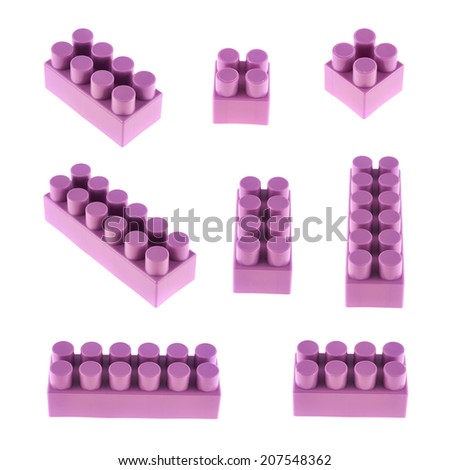 Set of plastic violet toy construction block bricks in multiple foreshortenings, isolated over the white background