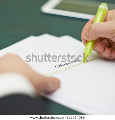 Marking words in a golden rule definition, shallow depth of field composition