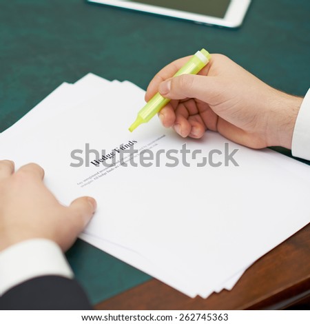 Marking words in a hedge funds definition, shallow depth of field composition