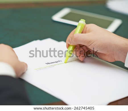 Marking words in a monopoly definition, shallow depth of field composition