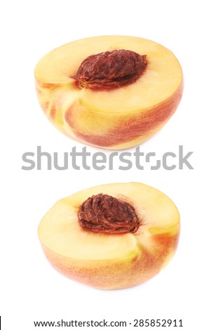 Cut open ripe nectarine half with a pit, composition isolated over the white background, set of two different foreshortenings