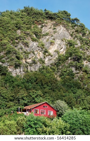 Red Mountain House near the mountain and trees,Turkey
