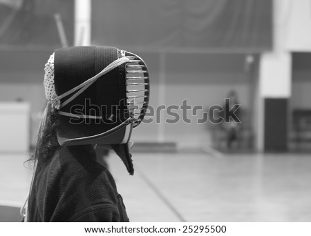 University students practice Kendo at a Sport Hall