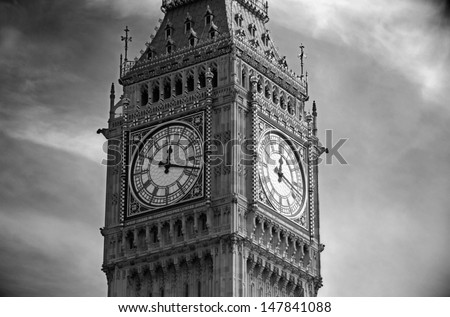 Big Ben against cloudy sky, black and white view