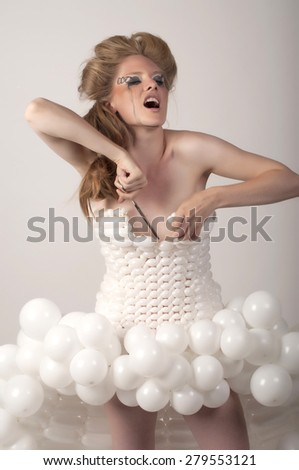 woman crying tears her dress of beads