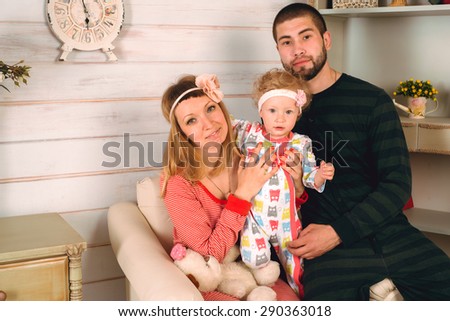 Portrait of a happy family, photo studio