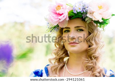 portrait photo aristocrat in a sunny summer green forest