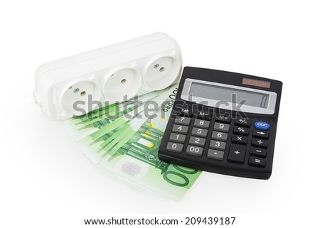 power socket money and a calculator isoleted on white background