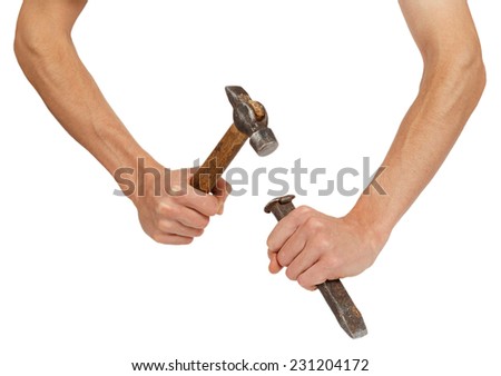 Male hands working with hammer and chisel isolated on white background