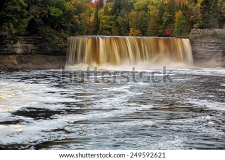 Tahquemenon Falls in the Upper Peninsula of Michigan. Sometimes referred to as the root beer falls because of the tannin that leaches from the surrounding cedar forest and into the river water.