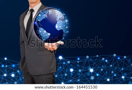 male holding glow globe and network connection background