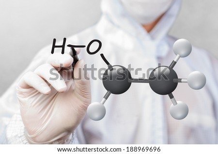 scientist in working suit drawing chemical structure